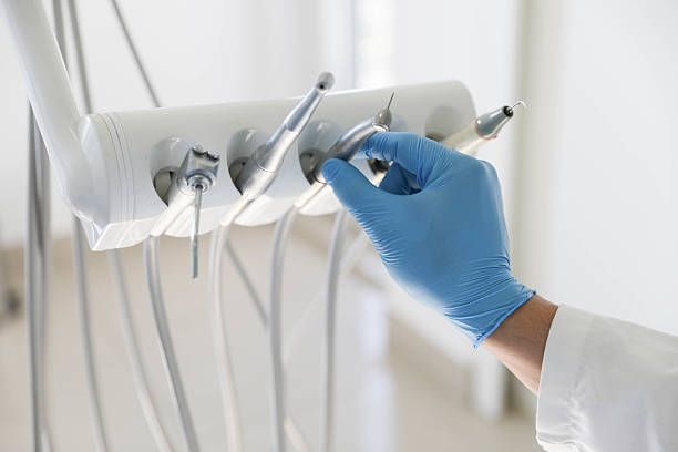 Professional Invisalign Clear Aligners technician working in Pelican Bay, TX